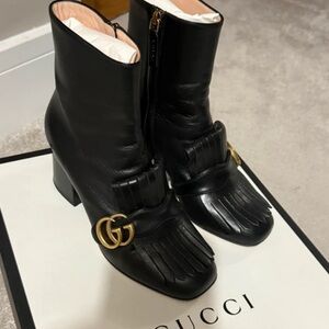 Gucci Black Leather Heeled Boots with Fringe and Gold Accent
